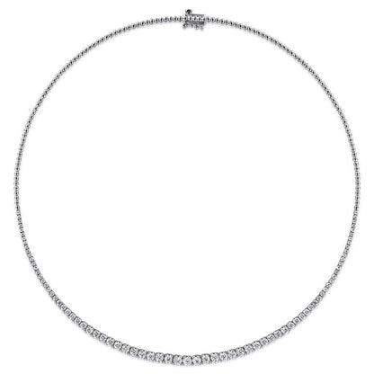 Graduated round diamonds in four-claw setting, half tennis necklace close-up, 18K gold