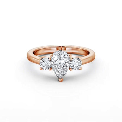 Trilogy ring with pear and round cut lab-grown diamonds in Rose gold